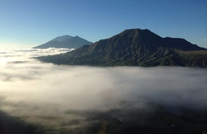 Mount Batur and Mount Abang above a sea of morning cloud